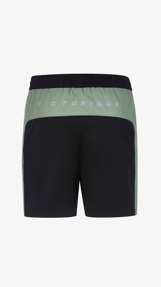 Cassius Short in green, black and grey, back view