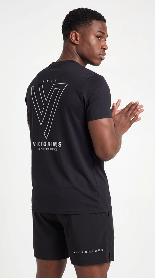 Model wearing the Black Ludus Training Tee & Short Set