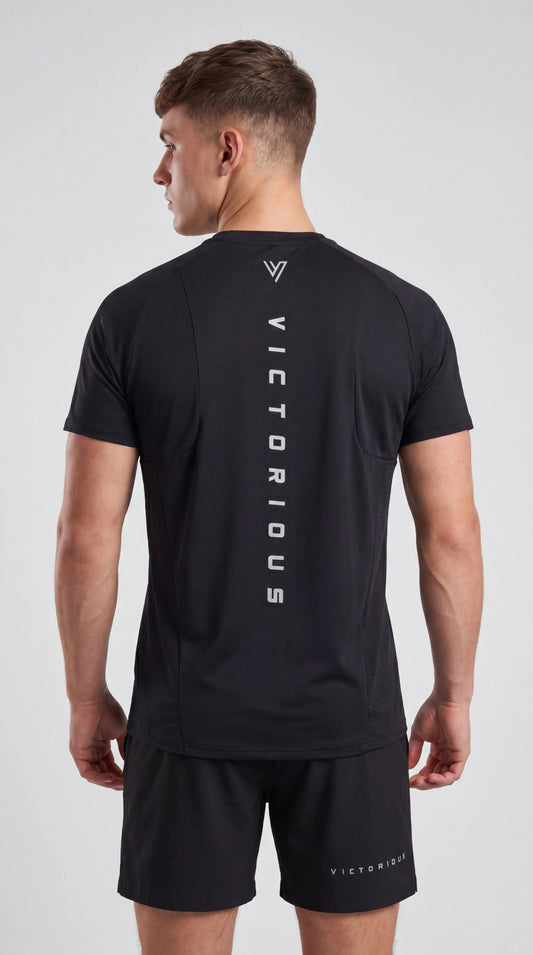 Model wearing the Black Training Tee & Short Set