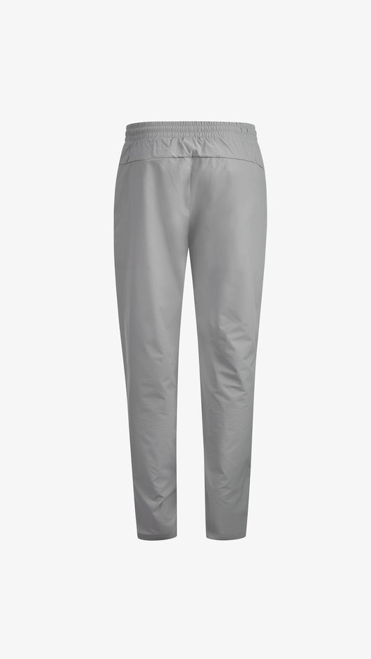 Grey/Mint Velum Windbreaker Pant, back view, reflective logo detail